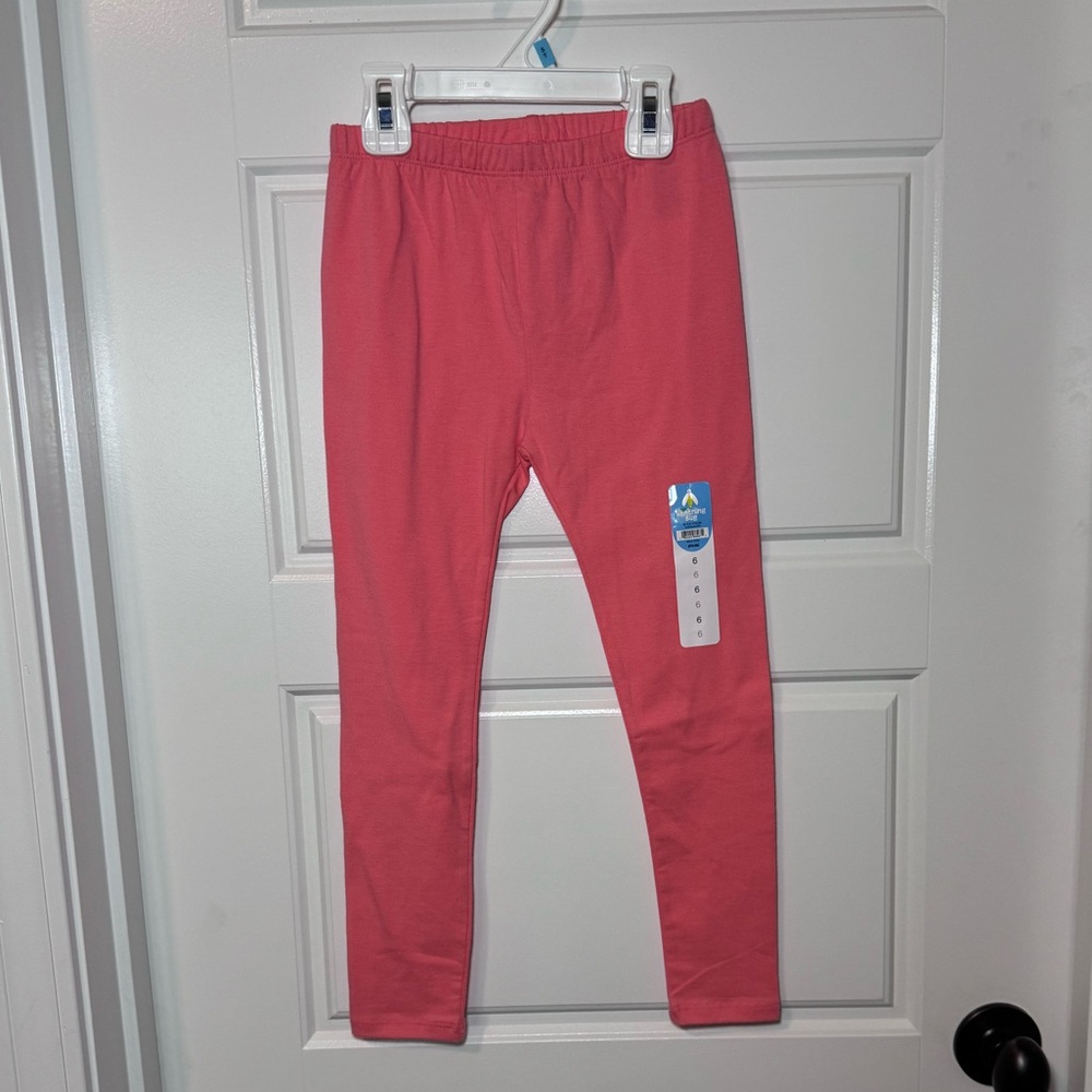 Lightning bug leggings, peach in color, girl size 6